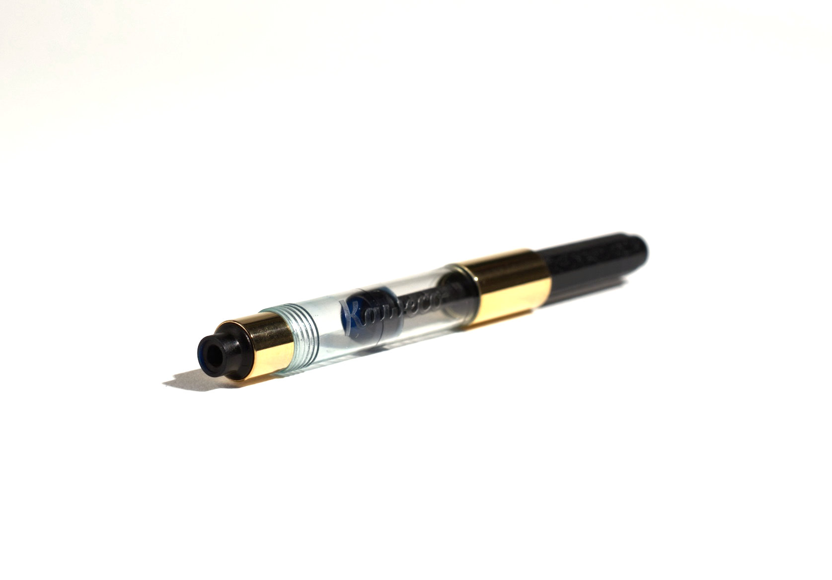 Kaweco Standard fountain pen converter with gold-plated accents.